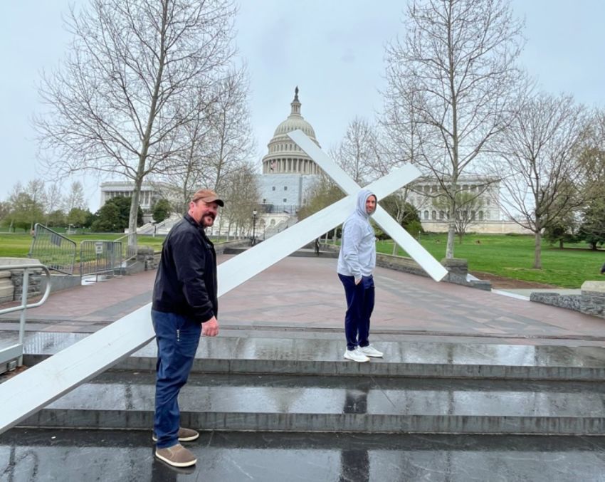Participants in a Good Friday service at the United States Capitol Building, spearheaded by the Christian Defense Coalition, carry a 15-foot cross on Capitol grounds, Apr. 7, 2023.