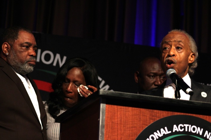 Civil rights activist Al Sharpton (podium), attorney Benjamin Crump (2nd R), react to the passing of the “Achieving Driving Equality” ordinance in Memphis, Tennessee, during the National Action Network Convention in New York City on April 12, 2023.Tyre Nichols' mother, RowVaughn Wells, and his stepfather, Rodney Wells, are also pictured.