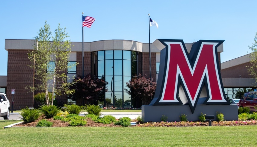 Flags fly on the campus of Mid-America Christian University of Oklahoma City, Oklahoma.