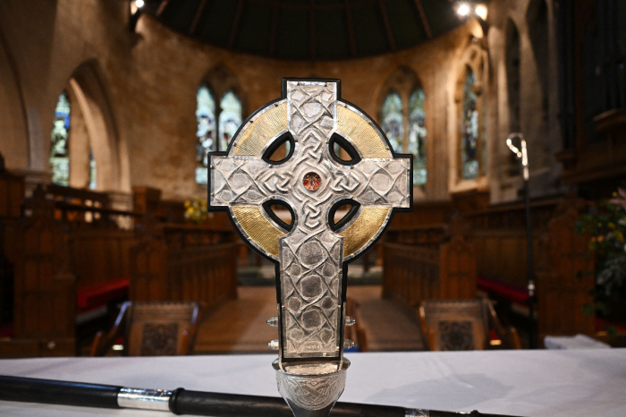 'The Cross of Wales' is displayed for a photograph ahead of a ceremony to bless the Cross at Holy Trinity Church in Llandudno, north Wales, on April 19, 2023. 