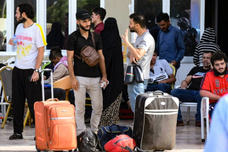 People wait to be evacuated from Port Sudan on April 27, 2023, amid ongoing battles between the forces of rival Sudanese generals. Multiple nations have scrambled to evacuate thousands of citizens and embassy staff by road, air and sea from chaos-torn Sudan, where fighting between the army and paramilitaries has killed hundreds.
