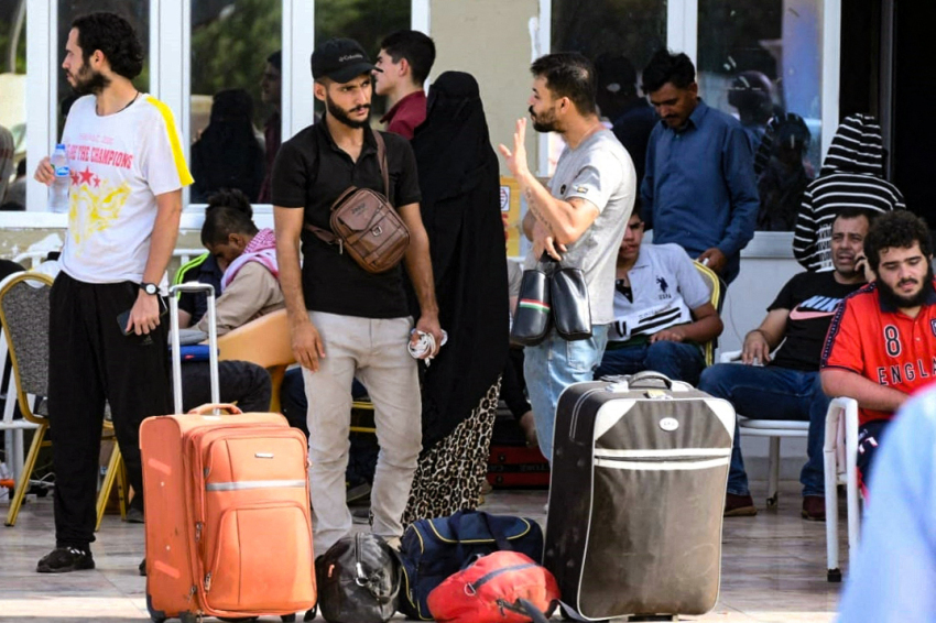 People wait to be evacuated from Port Sudan on April 27, 2023, amid ongoing battles between the forces of rival Sudanese generals. Multiple nations have scrambled to evacuate thousands of citizens and embassy staff by road, air and sea from chaos-torn Sudan, where fighting between the army and paramilitaries has killed hundreds.
