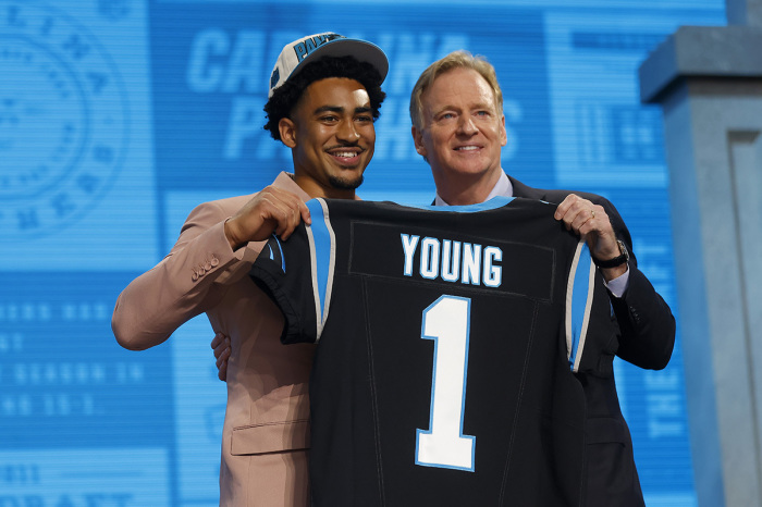 Bryce Young poses with NFL Commissioner Roger Goodell after being selected first overall by the Carolina Panthers during the first round of the 2023 NFL Draft at Union Station on April 27, 2023, in Kansas City, Missouri. 