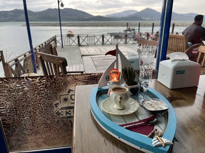 Turkish coffee served at the Arzava Restaurant with a view of Lake Egirdir in Turkey.