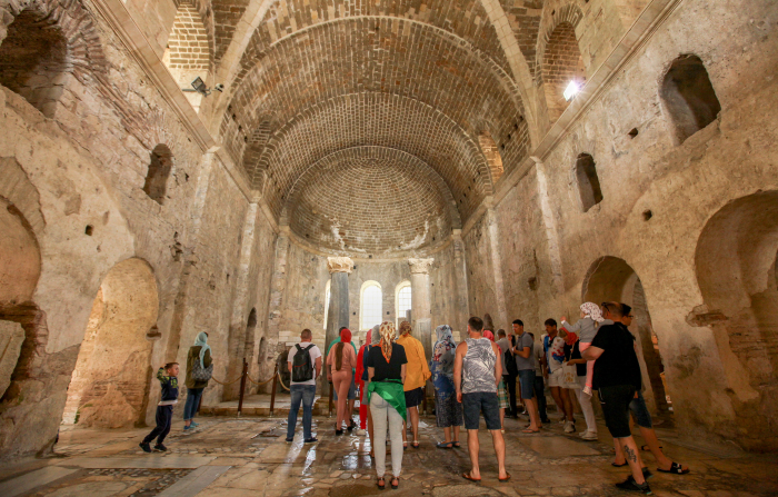 Tourists inside the restored St. Nicholas Church in Antalya, Turkey, in May 2023.