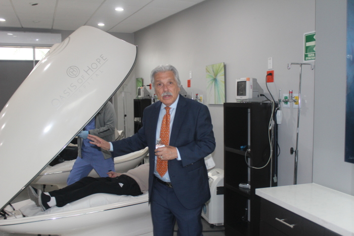 Dr. Francisco Contreras, director, president and chairman of the Oasis of Hope Hospital in Tijuana, Mexico, shows off the heating pods used in to treat cancer patients.