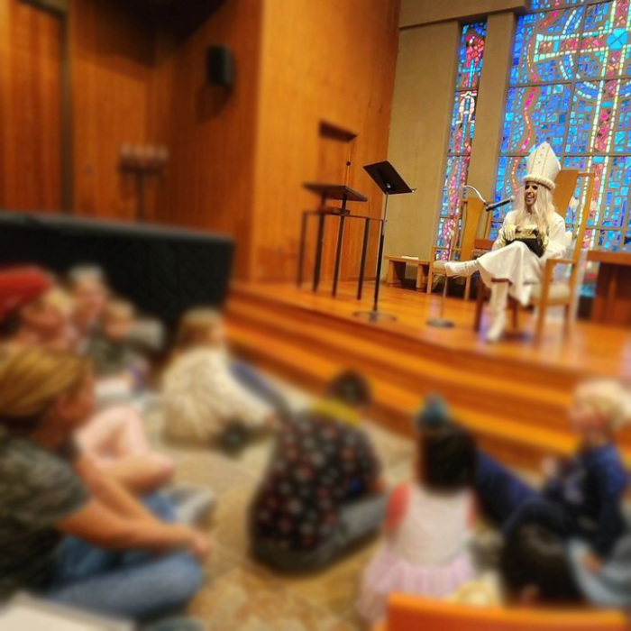 A man dressed as a woman performs in front of children during a service at Calvary Presbyterian Church in San Francisco.