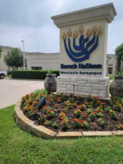 A sign sits outside the Baruch HaShem Messianic Synagogue in Dallas, Texas. 