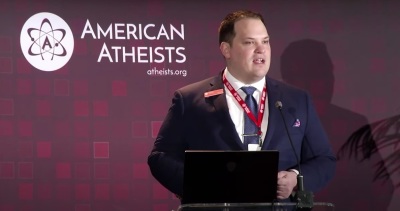 Nick Fish, president of American Atheists, speaks at a 2019 convention. 
