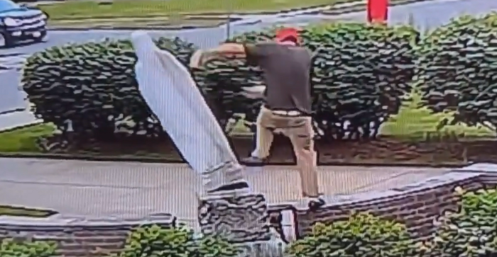 Security footage shows a man identified by police as Michael Manns, 40, pushing over the statue of the Virgin Mary at St. Rose of Lima Church at 500 Parker Avenue in Buffalo, N.Y.