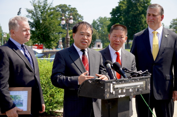 Pastor Pan Yongguang speaks at a press conference at the House Triangle near the United States Capitol Building in Washington D.C. on July 12, 2023.