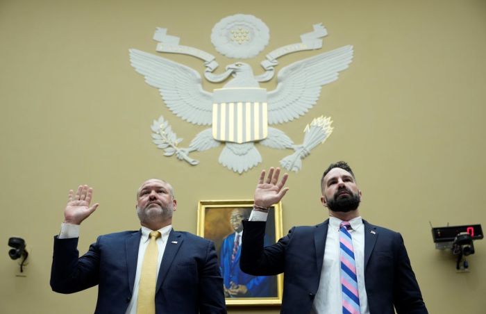 Supervisory IRS Special Agent Gary Shapley (L) and IRS Criminal Investigator Joseph Ziegler are sworn-in as they testify during a House Oversight Committee hearing related to the Justice Department's investigation of Hunter Biden, on Capitol Hill, July 19, 2023, in Washington, D.C. The committee heard testimony from two whistleblowers from the Internal Revenue Service who allege that the Hunter Biden criminal probe was mishandled by the Department of Justice. 