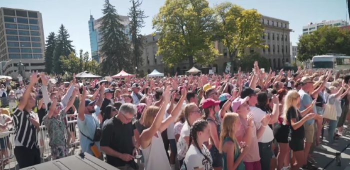 People gather in Boise, Idaho in late July 2023 for the Kingdom to the Capitol worship event hosted by Christian activist and singer Sean Feucht. 