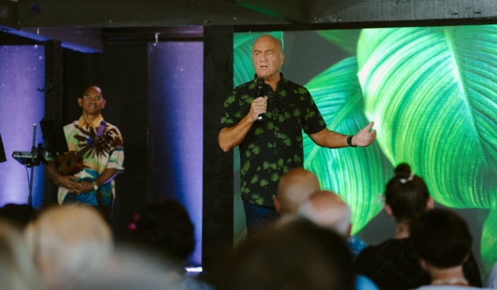 Pastor Greg Laurie speaks at a worship gathering held at Kumulani Chapel in Maui, a congregation affiliated with Harvest Christian Fellowship.