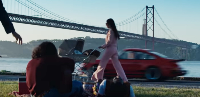 A screenshot of the Porsche ad includes a restored image of the Christ the King (Cristo Rei) statue.