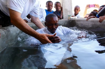 A man gets baptized at LiveBeyond in Thomazeau, Haiti.