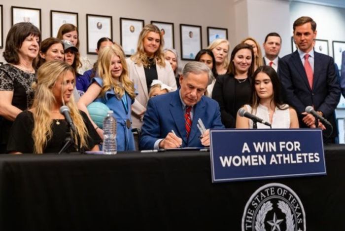 Texas Gov. Greg Abbott signs the Save Women's Sports Act in Denton, Texas, August 7, 2023. 
