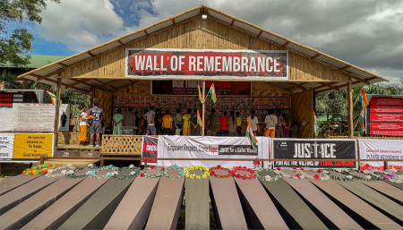A Wall of Remembrance in the Kuki-Zo Churachandpur area featuring empty coffins and photos of the 130 tribal Christians killed thus far in the ethnic violence in India's Manipur state, which began on May 3, 2023.