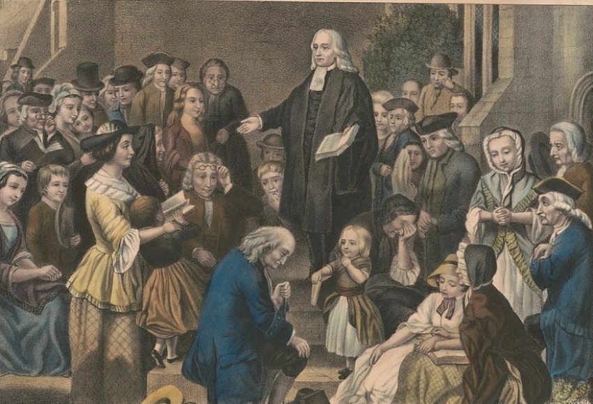 Methodism founder John Wesley preaching at a church yard in Epworth, England in 1742.