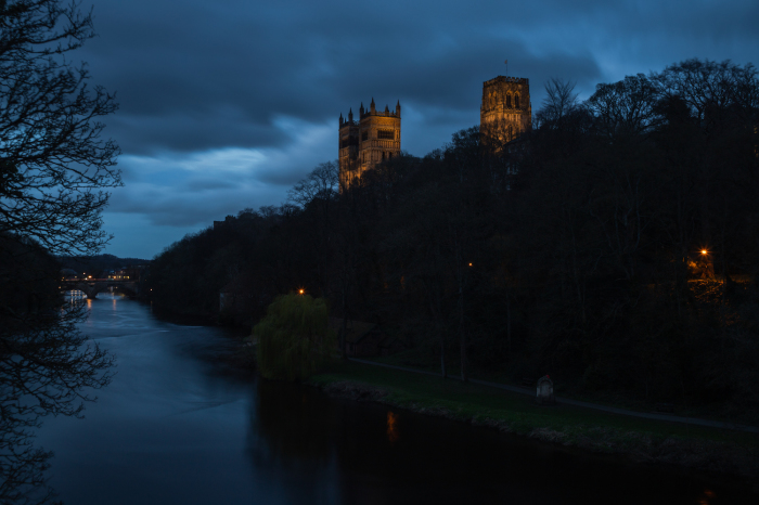 Durham Cathedral sits above a bend in the River Wear in Durham, England.