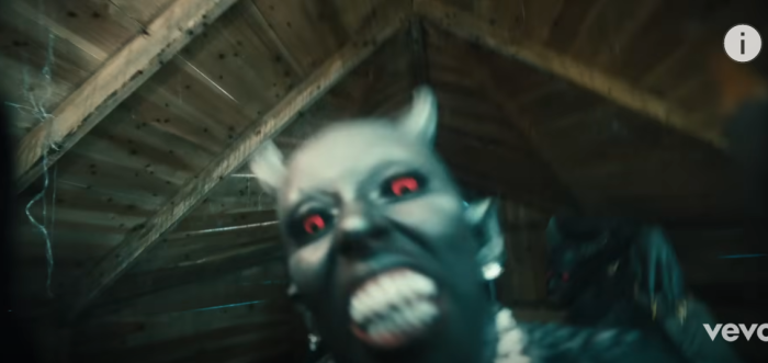 A screenshot of the 'Demons' music video.