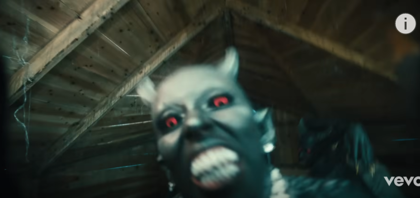 A screenshot of the "Demons" music video.