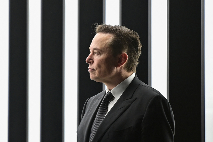 Tesla CEO Elon Musk is pictured as he attends the start of the production at Tesla's 'Gigafactory' on March 22, 2022 in Gruenheide, southeast of Berlin. - US electric car pioneer Tesla received the go-ahead for its 'gigafactory' in Germany on March 4, 2022, paving the way for production to begin shortly after an approval process dogged by delays and setbacks. (Photo by Patrick Pleul / POOL / AFP) (Photo by PATRICK PLEUL/POOL/AFP via Getty Images)