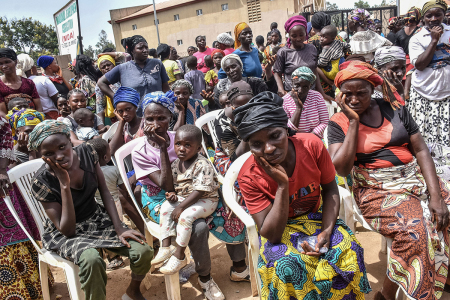Nigerian internally displaced persons are seen at a temporary shelter in Mangu, near Jos in the Plateau state in Nigeria, on May 20, 2023. More than 100 people in central Nigeria have died in several days of intercommunal violence that have destroyed hundreds of homes and caused thousands to flee, local officials said. The clashes between cattle herders and farming communities in Plateau State are the worst in years in a region that has long struggled with ethnic and religious tensions and reprisal attacks.