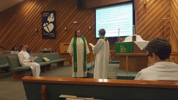 Karen Perkins (standing L) was installed as the pastor of Resurrection Lutheran Church in Juneau, Alaska, in November 2017.