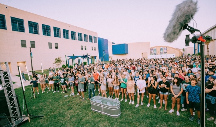 A crowd of students gather at the campus of Texas A&M Corpus Christi on Aug. 31, 2023 for a revival event known as 'One Night,' which was organized by the Christian student group New Life Young Adults. 