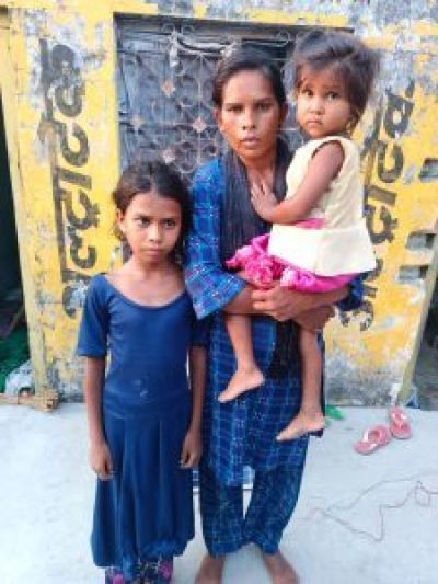 Wife and children of Pastor Bajarang Rawat in Mohanlalganj, Uttar Pradesh, India. 