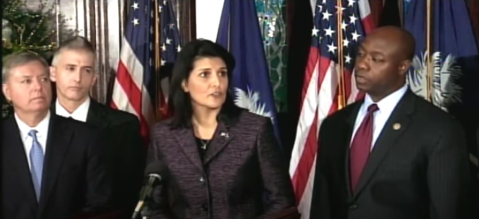 South Carolina's Republican Gov. Nikki Haley holds a press conference alongside members of her state's congressional delegation as she unveils Rep. Tim Scott, R-S.C., as her choice to succeed departing Sen. Jim DeMint, R-S.C., in a Dec. 17, 2012, press conference. 