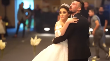The moment Christian bridegroom Revan, also identified as Ivan Esho (L), 27, and his bride Haneen (R), 18, realized a fire was breaking out at their wedding celebration in Iraq.