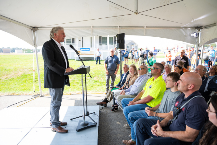 Franklin Graham, the president and CEO of the Christian natural disaster relief organization Samaritan's Purse, speaks to a crowd as he dedicates each house in the New Hope Acres Community of Mayfield, Kentucky, on Sept. 29, 2023. 