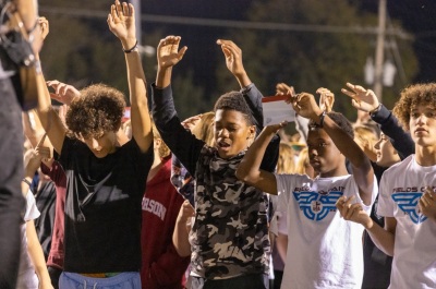 Thousands worship at the Fields of Faith event held at the Lakeside High School Stadium of Hot Springs, Arkansas, on Wednesday, Oct. 11, 2023. Fields of Faith is overseen by the Fellowship of Christian Athletes. 