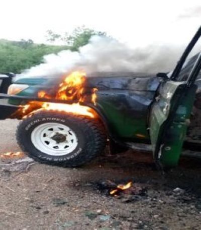 Vehicle of Christian tour guide Eric Alyai set ablaze after he was slain along with two tourists in western Uganda on October 17, 2023. 
