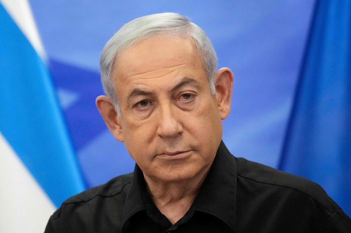 Israeli Prime Minister Benjamin Netanyahu addresses media during a joint press conference with French President in Jerusalem on October 24, 2023. Macron's visit comes more than two weeks after Hamas terrorists stormed into Israel from the Gaza Strip and killed at least 1,400 people, injured thousands and took 222 people hostage. 