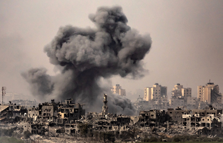 This image taken from the Israeli border with the Gaza Strip on October 29, 2023, shows a black cloud of smoke ascending from the Gaza Strip amid the ongoing battles between Israel and the Palestinian terrorist group Hamas. The Israeli army has raised the number of troops fighting inside the Gaza Strip, a spokesman said on October 29, 2023, as the military stepped up its war on Hamas in the Palestinian territory. Thousands of civilians, both Palestinians and Israelis, have died since October 7, 2023, after Hamas terrorists based in the Gaza Strip stormed into southern Israel in an unprecedented attack, torturing and murdering civilians, triggering a war declared by Israel on Hamas with retaliatory bombings on Gaza.