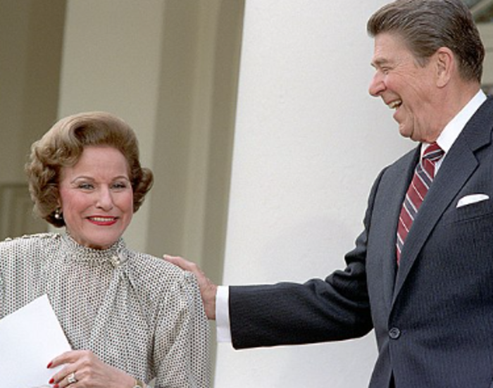 Advice columnist Abigail Van Buren appears with President Ronald Reagan in the Rose Garden of the White House in Washington, D.C., Feb. 22, 1985. 