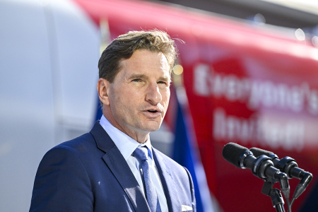 U.S. Rep. Dean Phillips, D-Minn., holds a rally outside of the N.H. Statehouse after handing over his declaration of candidacy form for president to the New Hampshire Secretary of State David Scanlan, on October 27, 2023, in Concord. While touting the accomplishments of President Biden, Rep. Phillips believes that new democratic leadership is needed and has joined the 2024 presidential race.