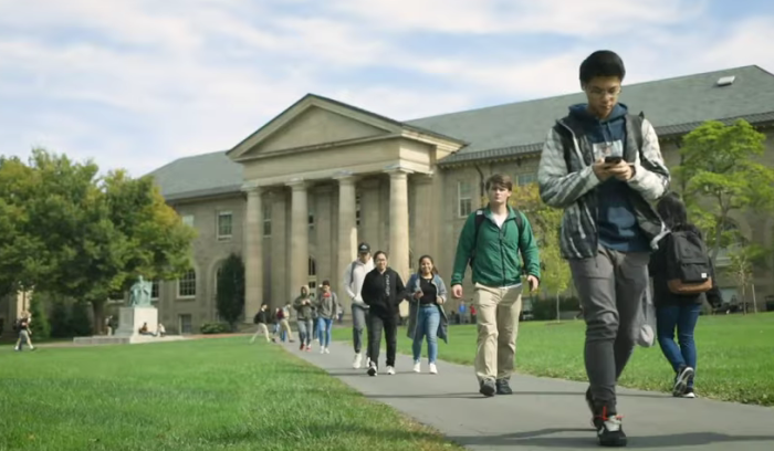 Students walk on the campus of Cornell University in Ithica, New York, as seen in a campus tour video posted online in May 2022. 