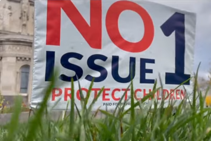 A sign opposing Ohio's Issue 1 sits outside an Archdiocese of Cincinnati property in October 2023. 