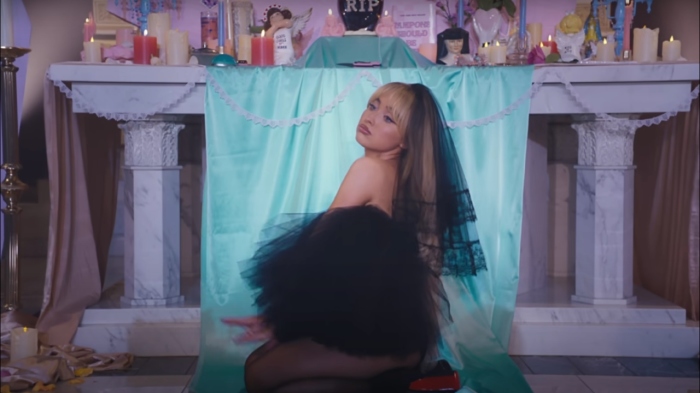 Pop star Sabrina Carpenter dances provocatively in front of the altar of the Blessed Virgin Mary Church in Brooklyn during her music video 'Feather.'
