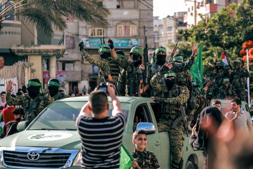 Hamas militants parade at a rally.