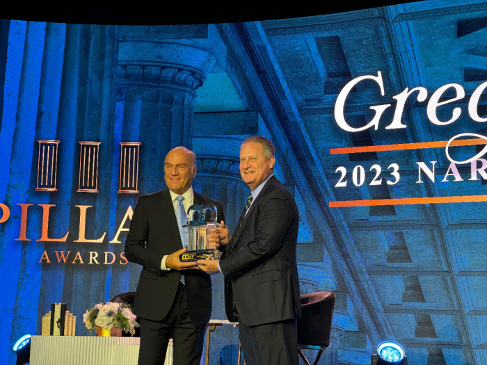 Pastor Greg Laurie (left) accepts the Pillar Award for narrative at the Museum of the Bible in Washington, D.C., November 11, 2023. 