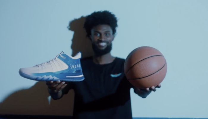 Christian NBA player Jonathan Isaac poses with shoes from his UNITUS JUDAH 1 sneaker line in a promotional video posted on Nov. 16, 2023. 