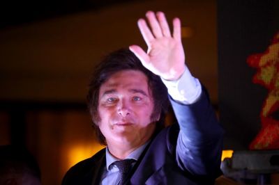 Newly elected President of Argentina Javier Milei of La Libertad Avanza greets supporters after the polls closed in the presidential runoff on November 19, 2023 in Buenos Aires, Argentina. According to official results, Javier Milei of La Libertad Avanza reached 55,69% of the votes and Sergio Massa of Union Por La Patria 44,30%, with 99,25 of the votes counted. The presidential election runoff to succeed Alberto Fernandez comes as Argentinians have been hard hit by an annual 142,7% inflation. 