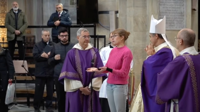 Video from Italian outlet Il Fatto Quotidiano shows an Extinction Rebellion activist at one point flanked by Repole and other clergy in the Turin Cathedral on Dec. 3, 2023.