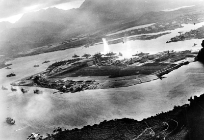 Photograph taken from a Japanese plane during the torpedo attack on ships moored on both sides of Ford Island shortly after the beginning of the Pearl Harbor attack on Dec. 7, 1941.