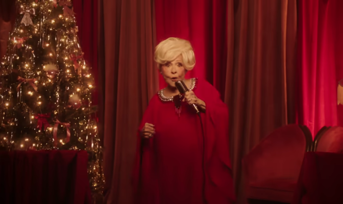Brenda Lee performs in the music video for 'Rockin' Around The Christmas Tree' published in November 2023.